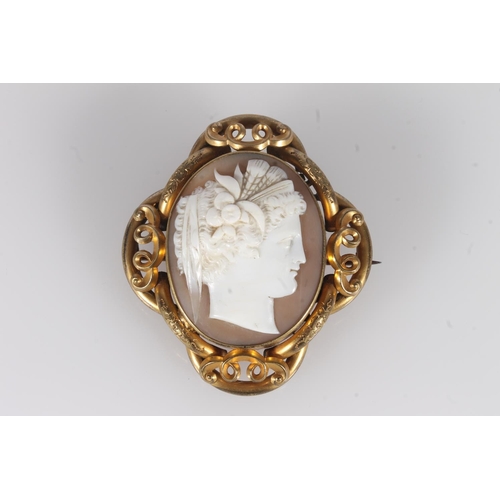 234 - Victorian cameo brooch, the shell cameo with typical classical maiden bust, withing a scrolled pinch... 