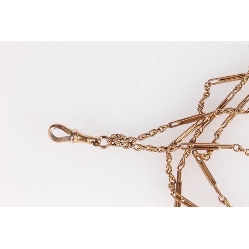 244 - Edwardian 9ct gold rope link muff chain, 33.2g.