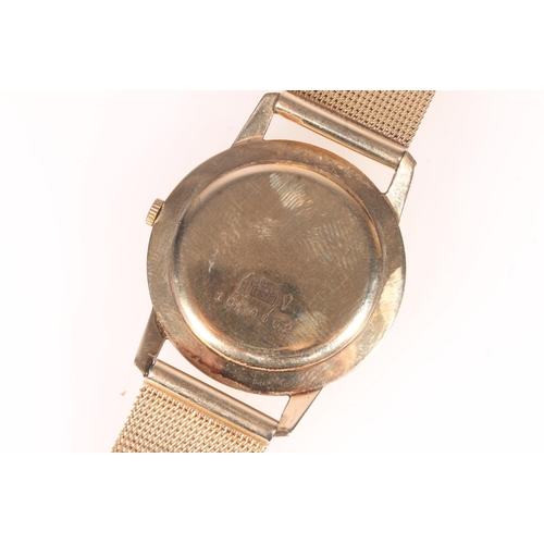 258 - 9ct gold Realm wristwatch, the champagne dial with baton hands and markers, subsidiary seconds under... 