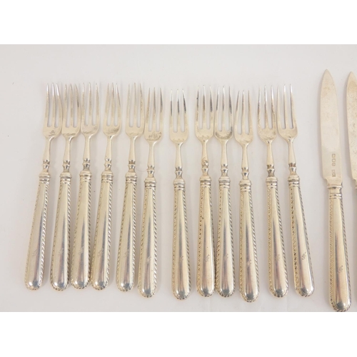 15 - Good comprehensive feather edge silver service by Mappin & Webb 1916, comprising: twelve soup sp... 