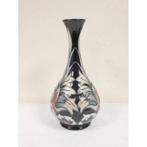 182 - Moorcroft Snakeshead design vase, copyrighted for 1995, with impressed and painted marks to base. He... 