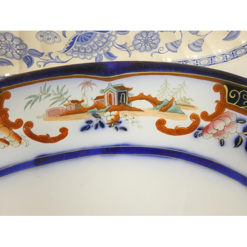 185 - 19th century glazed pottery Chinoiserie meat tray with pagoda panels, also a twin handled pottery se... 