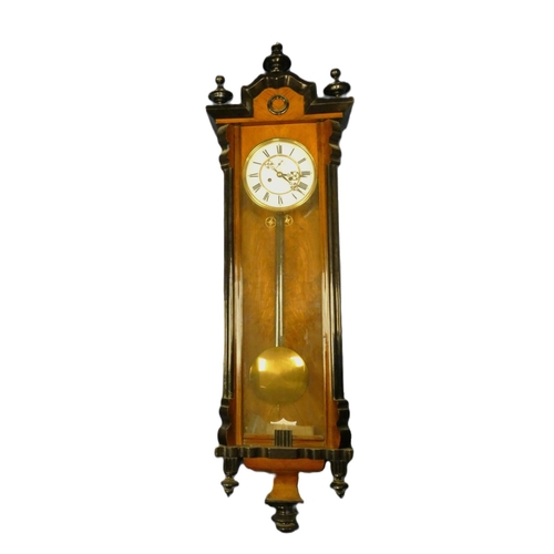 135 - Vienna Regulator style wall clock in mahogany case with ebonized surmounts, C1860. Height 113cm.