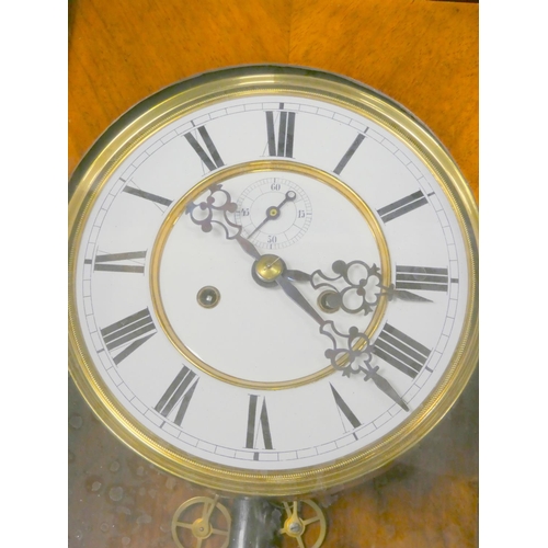 135 - Vienna Regulator style wall clock in mahogany case with ebonized surmounts, C1860. Height 113cm.