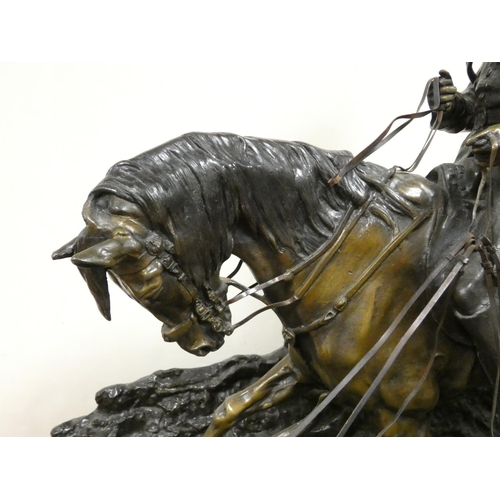 145 - After P.J. Mene (French, 1810-1879) 'Valet De Chasse', a very large patinated cast bronze equestrian... 