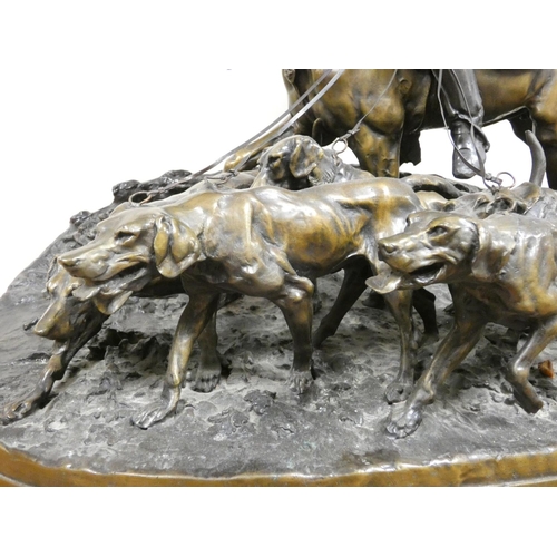 145 - After P.J. Mene (French, 1810-1879) 'Valet De Chasse', a very large patinated cast bronze equestrian... 