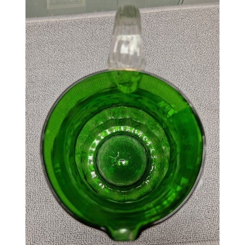 299 - Mary Gregory green glass jug, 20cm high