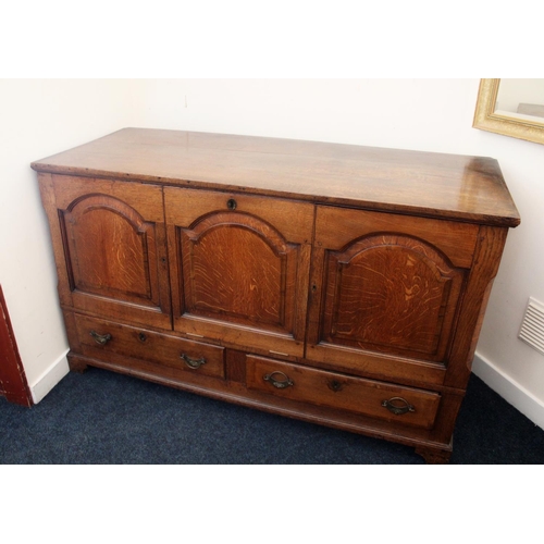 634 - Oak Mule chest, the three arched panels opening to reveal shelved compartment, above two drawers on ... 