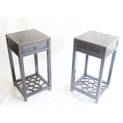 621 - Pair of ebonised Chinese side tables, with frieze drawer on straight legs united by pierced under ti... 