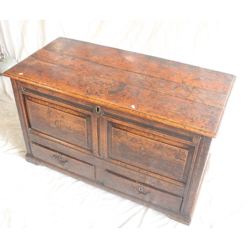 630 - 18th century oak mule chest, moulded hinged lid over panelled front, fitted with two drawers, W121cm... 