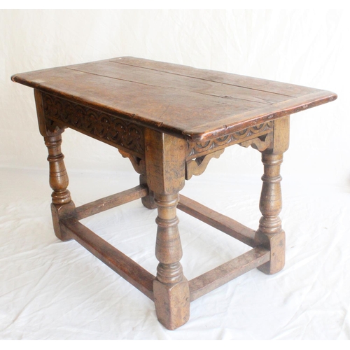 651 - Antique oak Carolean Revival style joined oak side or refectory table, the three plank top above car... 