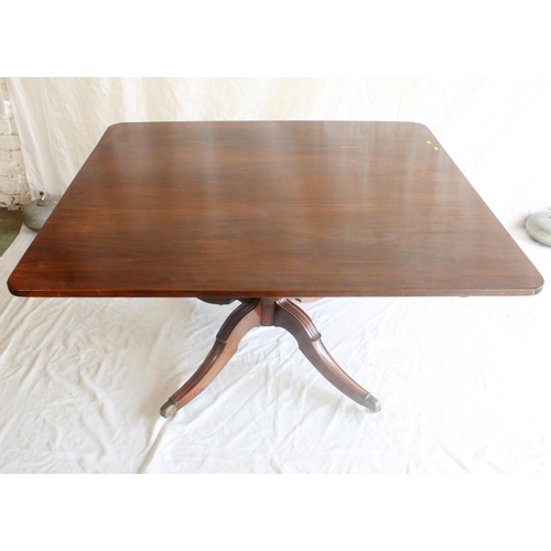 656 - Early 19th century mahogany tilt top breakfast table, the rectangular top with rounded corners raise... 