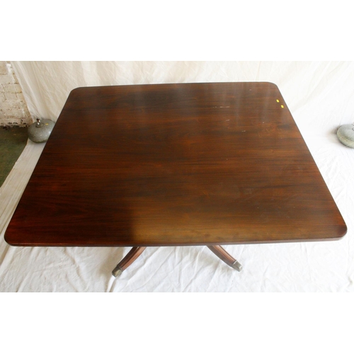 656 - Early 19th century mahogany tilt top breakfast table, the rectangular top with rounded corners raise... 