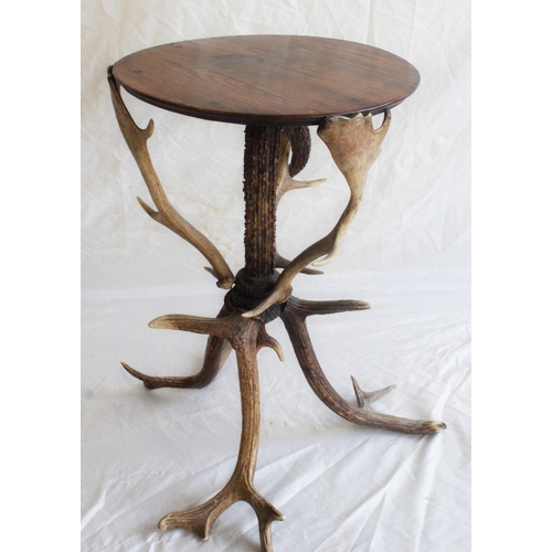 661 - Natural History interest, a rustic occasional table, the circular oak top raised on stag horn base, ... 