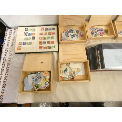 414 - Large box of First Day Covers and loose world stamps.