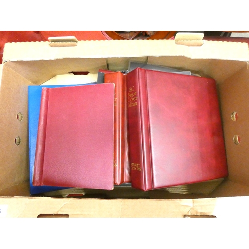 425 - Box of empty stamp albums.