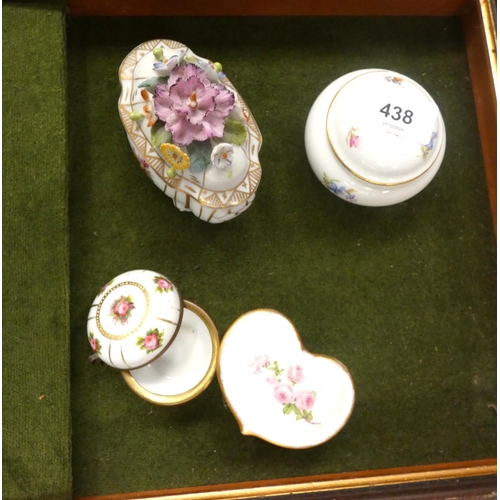 438 - Four vintage trinket boxes.