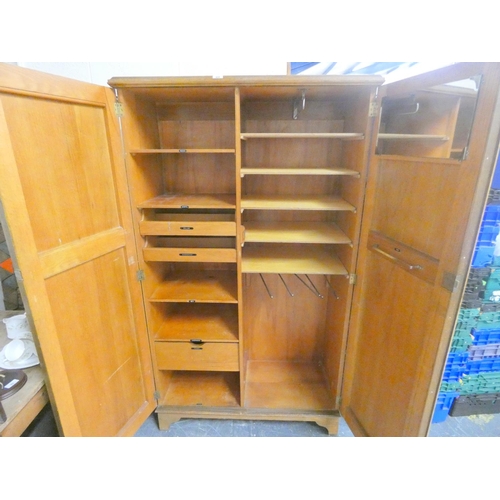 459 - Gentleman's oak compactum type wardrobe.