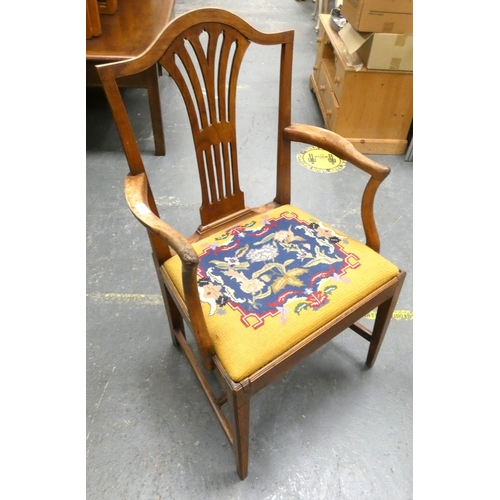 466 - Antique, oak elbow chair. 