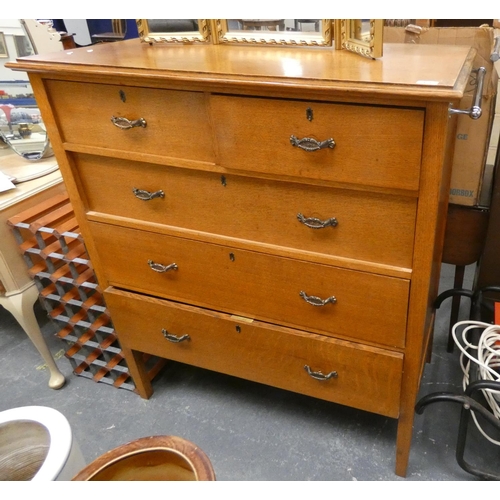 474 - Two short over three long oak chest of drawers.