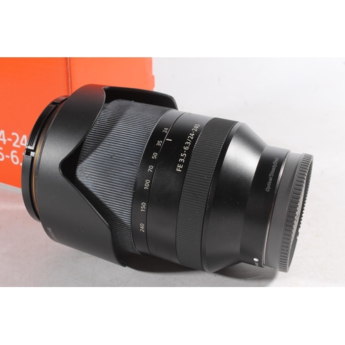 1126 - Sony Alpha series camera lens SEL24240 FE24-240mm F3.5-6.3 OSS 72mm lens, serial number 1973480, box... 