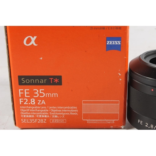 1129 - Sony Alpha series camera lens SEL35F28Z Sonnar T* FE 35mm F2.8 ZA 49mm, serial number 1850556, boxed... 