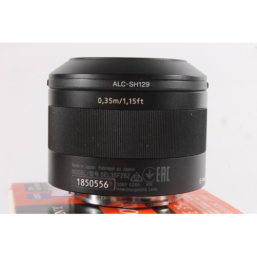 1129 - Sony Alpha series camera lens SEL35F28Z Sonnar T* FE 35mm F2.8 ZA 49mm, serial number 1850556, boxed... 