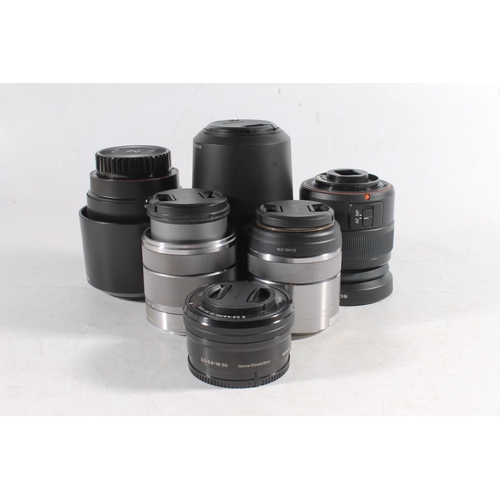 1132 - Sony camera lenses to include SAL55200 DT4-5.6/55-200 55mm lens, serial number 1858843, SEL55210 4.5... 