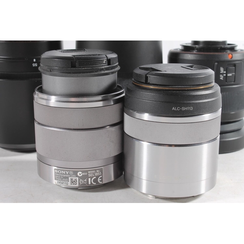 1132 - Sony camera lenses to include SAL55200 DT4-5.6/55-200 55mm lens, serial number 1858843, SEL55210 4.5... 