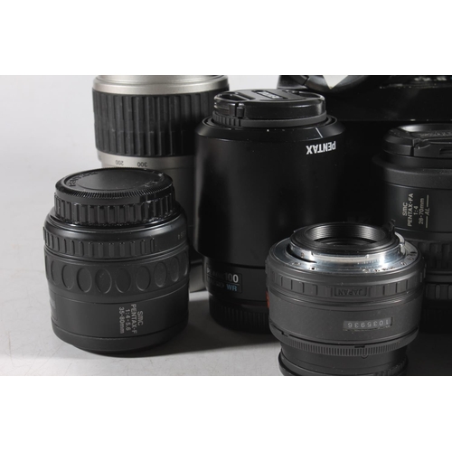 1143 - Group of ten Pentax camera lenses to include:SMC DFA Macro WR 2.8 100mm 49mm lens boxed; SMC FAJ1:4(... 