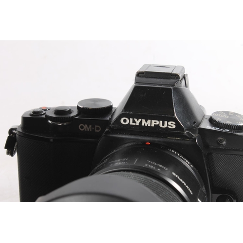 1145 - Olympus OM-D E-M5 digital camera with Olympus M Zuiko 40-150mm 4-5.6 58mm lens, another Olpmus OM-D ... 