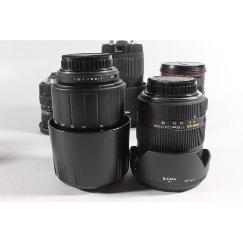 1146 - Six Sigma camera lenses to include a Sigma DC EX 50-150mm 1:2.8 II APO HSM lens, serial number 10133... 