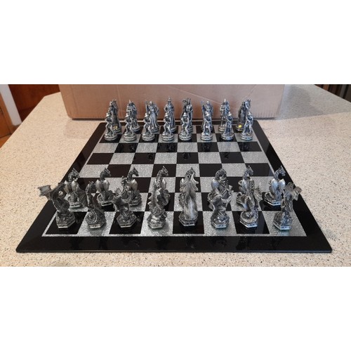 164 - Tudor Mint Wizards and Dragons chess set with board, 2002 (one shelf).