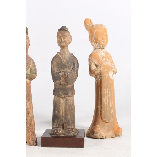 464 - Four ancient antiquarian Chinese terracotta tomb figures, the largest 30cm tall. (4)