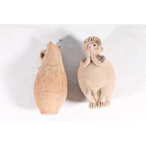 472 - Ancient pre Columbian earthenware jar modelled as an animal, 10.5cm tall, and an ancient earthenware... 