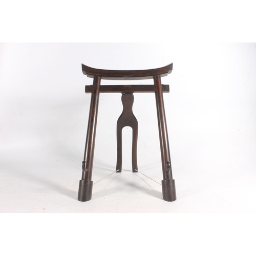 609 - Hardwood easel stand in the form of a Shinto shrine 35cm x 23cm.