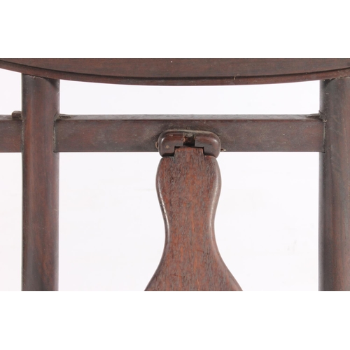 609 - Hardwood easel stand in the form of a Shinto shrine 35cm x 23cm.