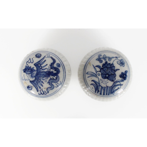 546 - Pair of domed boxes and covers, possibly Korean, with phoenix and duck decoration, the edges ribbed,... 