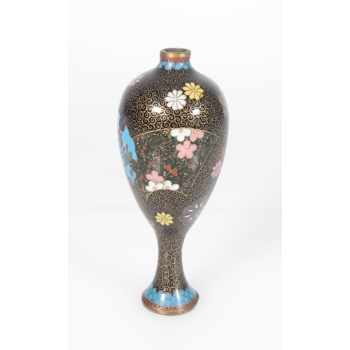 551 - Small cloisonne vase of tapering egg form, supported on an elongated spreading foot, the black ename... 