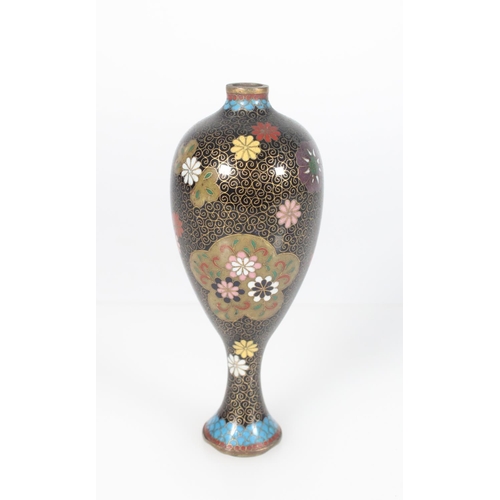 551 - Small cloisonne vase of tapering egg form, supported on an elongated spreading foot, the black ename... 