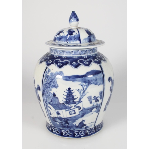 565 - 19th century Chinese blue and white jar and cover, the domed lid with teardrop finial, decorated wit... 