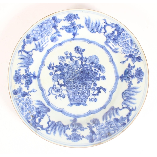 568 - 18th century Chinese blue and white plate with flower basket decoration, 22cm and three other plates... 