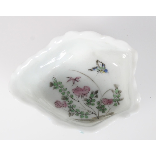 577 - Small Chinese famille rose dish, lipped for pouring water, the body moulded with the shape of lotus ... 