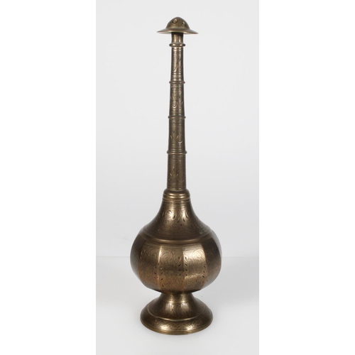 580 - Late 19th century heavy brass rosewater sprinkler of typical form the body with twelve panels decora... 