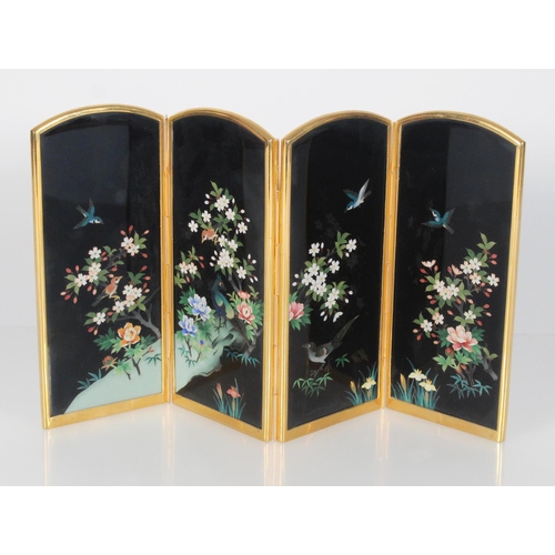 581 - A good quality early 20th century Japanese black ground four-fold cloisonne table screen with arched... 