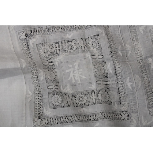 584 - Two late 19th century pieces of fine white work, a Chinese table cloth with elaborate drawn thread w... 