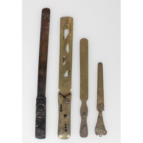 595 - Group of four Japanese letter openers the smallest 16cm depicting a bird perched on fishing nets, th... 