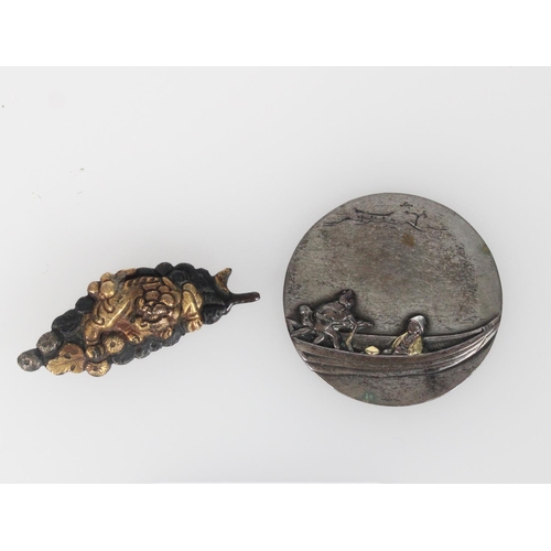 598 - Japanese sword fitting, menuki, in partly gilded bronze, depicting a dragon on a leaf and a small si... 