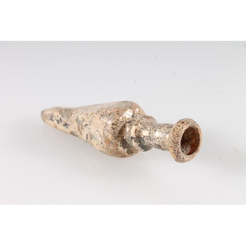 476 - Ancient Greek glass alabastron scent bottle, the clear glass body of tapering form, 8.8cm long.