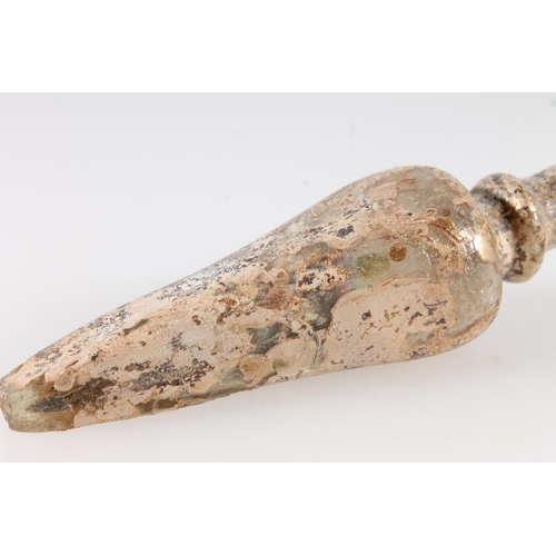 476 - Ancient Greek glass alabastron scent bottle, the clear glass body of tapering form, 8.8cm long.